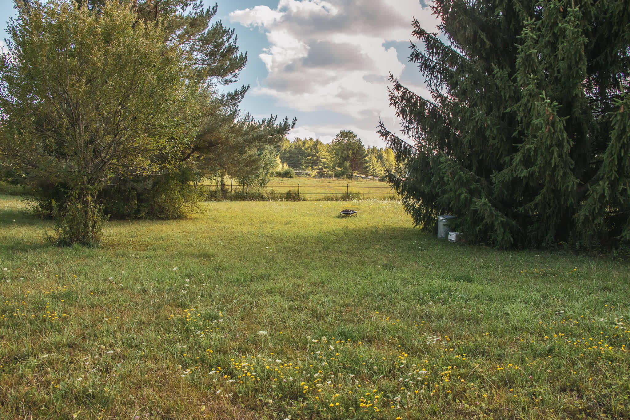 The second camp area with a firepit